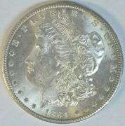 Snowy-white BU 1884-CC Morgan Silver Dollar. Scarce