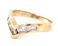 14kt Yellow gold 0.50ctw channel set curved diamond band