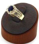 14kt Yellow gold oval sapphire and diamond halo channel set ring
