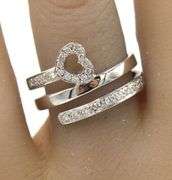 18kt White gold 0.25ctw 3 row heart diamond ring