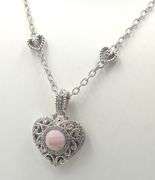 Judith Ripka silver heart station necklace with pink quartz heart enhancer
