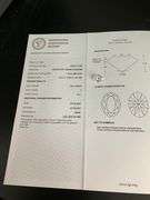 I.G.I CERTIFIED 7.05 CARAT OVAL SHAPED DIAMOND.