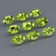 Fantastic 4.99ct 6x4mm oval cut Peridot set