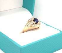 14kt Yellow gold 0.75ct sapphire with 0.50ctw diamond ring
