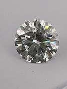 I.G.I CERTIFIED 5.03 CARAT ROUND BRILLIANT CUT DIAMOND. IDEAL CUT.