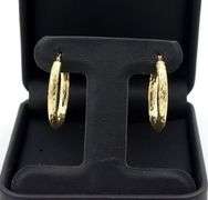 14kt Yellow gold diamond cut hoop earrings
