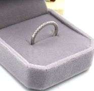 Platinum 0.15ctw shared prong diamond band