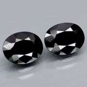 Matched! 13x10mm pair of all black Tektite weighing 13.52 carats!