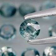 Heated only! 4.52ct blue green Sapphire set