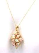 18kt Yellow gold opal cluster and diamond accent pendant on chain and matching earrings