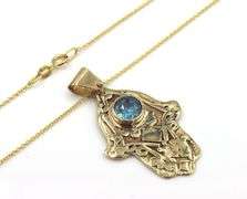 14kt Yellow gold Vintage Hamsa pendant with blue stone