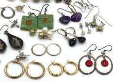 Group lot of vintage 925 sterling silver stud and dangle earrings