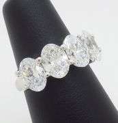 Incredible 5.05CTW Five Stone Oval Diamond Band