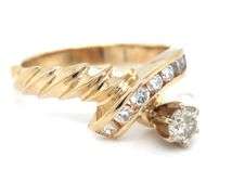 14kt Yellow gold 0.50ctw channel set twisted shank engagement ring