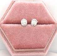 One pair of 14kt white gold 0.81ctw round brilliant cut diamond stud earrings