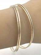 18kt White and yellow gold set of 5 bangles