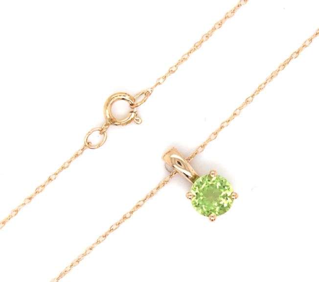 14kt Yellow gold 0.55ct Peridot pendant on chain