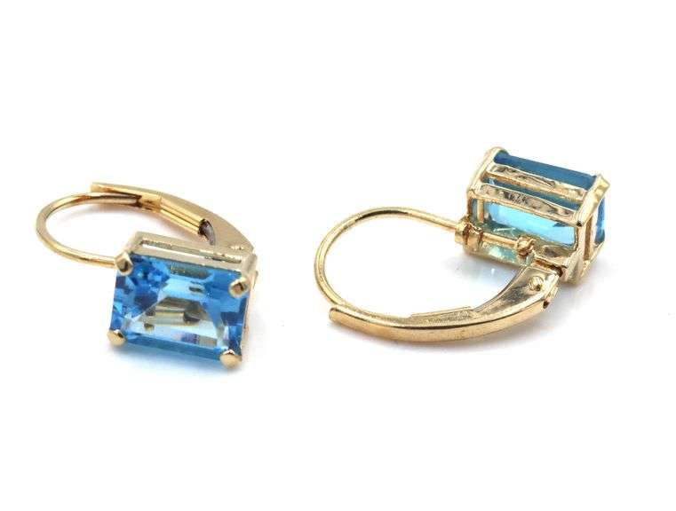 14kt Yellow gold emerald cut blue topaz lever back earrings