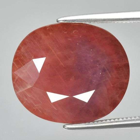 Unique 8.02ct Padparadscha colored pinkish orange Sapphire