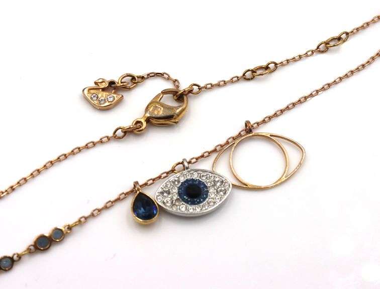 Swarovski symbolica evil eye blue stone pendant on gold plated chain necklace