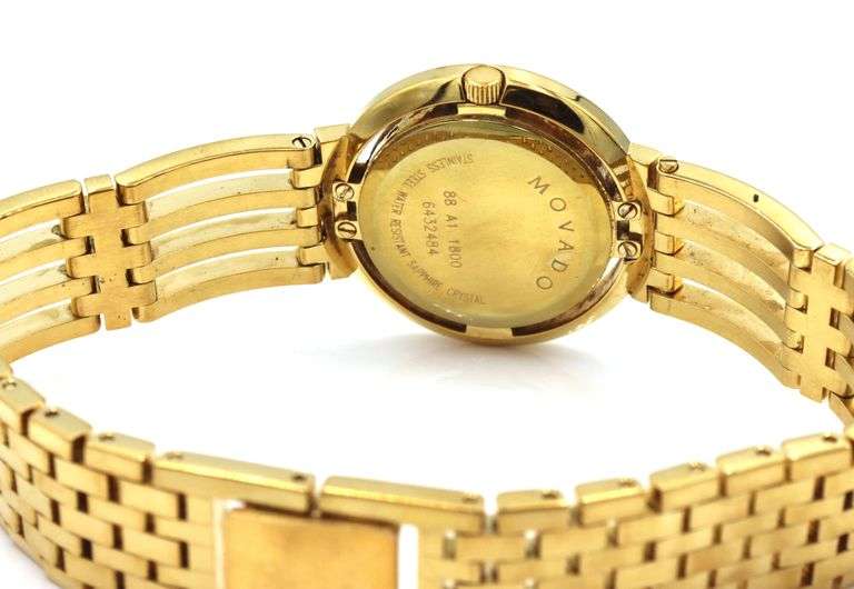 Movado Esperanza gold tone quartz black dial watch