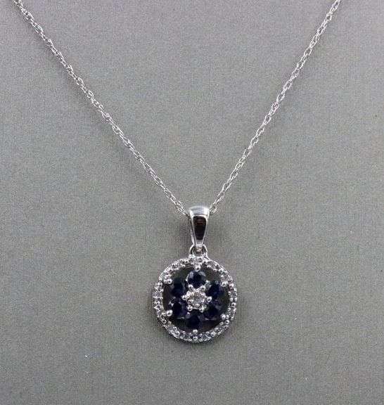 10kt White gold sapphire and diamond halo flower pendant on chain