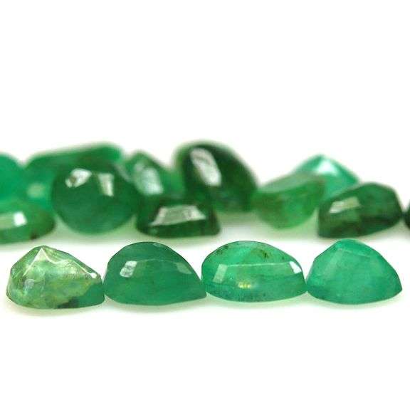 Pear cut 6.03ct Zambian Emerald set