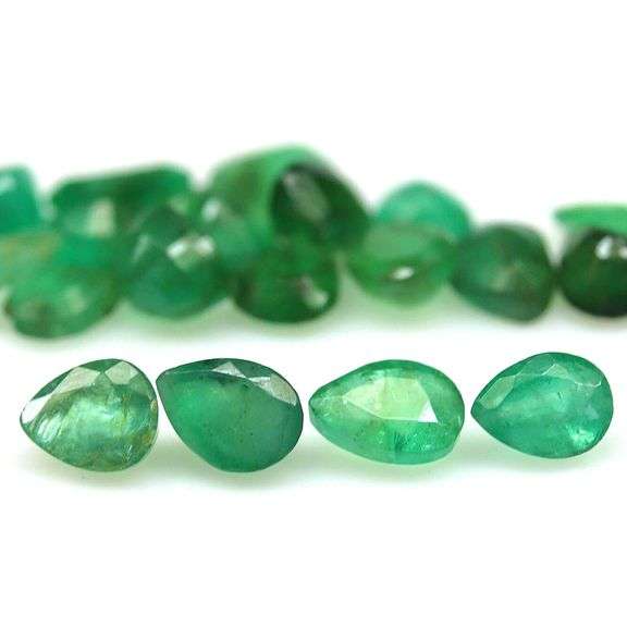 Pear cut 6.03ct Zambian Emerald set