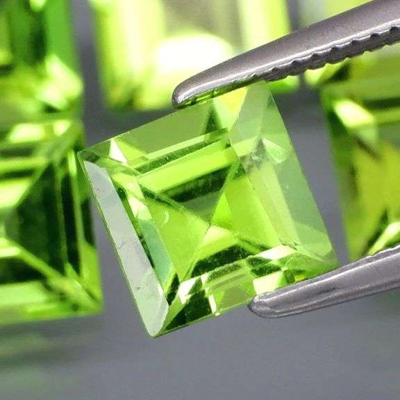 High fire brightly colored 6.26ct Peridot set!