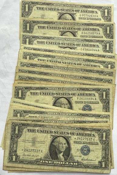 33 Various 1957 Series $1 Silver Certificates.