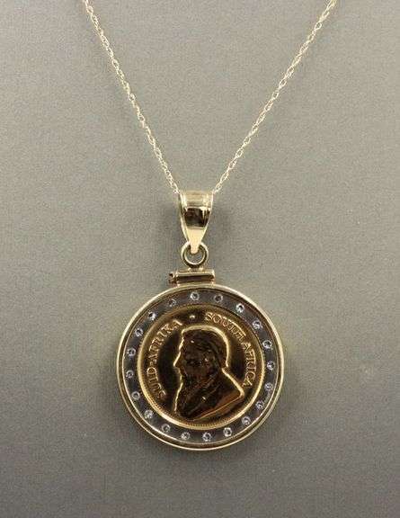 1/10oz Kruferrand coin pendant on 14kt yellow gold chain