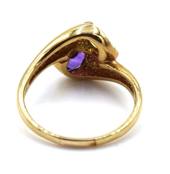 14kt Yellow gold amethyst and peridot bypass ring