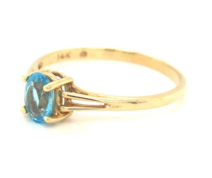 14kt Yellow gold oval blue topaz cocktail ring