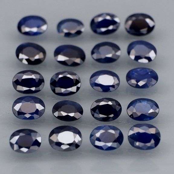 Beautifully colored 4.03ct ink blue Sapphire set
