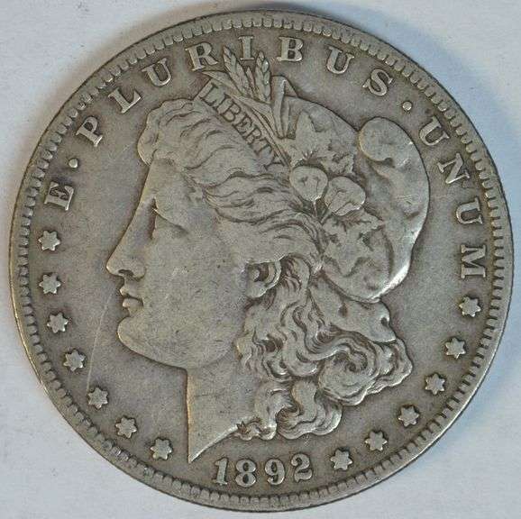 Highly collectible 1892-S Morgan Silver Dollar. Nice VF/XF