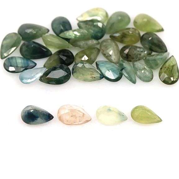 Multi-hue 7.38ct natural blue green Sapphire set