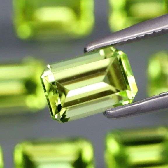 Brilliant 6.31ct 10pc set of matched baguette cut Peridot