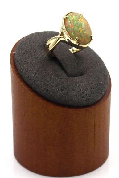 14kt Yellow gold oval opal Crisscross ring