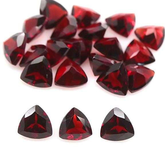 Stunning wine red 10.81ct trillion cut untreated Garnet set