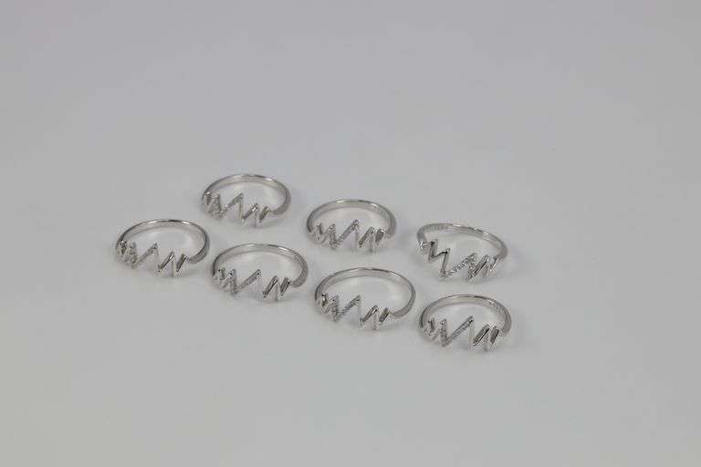 .925 Sterling Silver EKG Rings Lot of 40 Rings Various Sizes