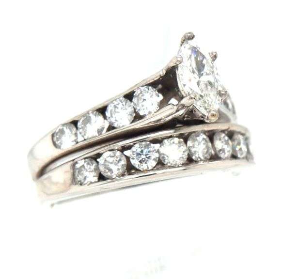 14kt White gold 0.40ct marquise and 0.75ctw channel set engagement ring