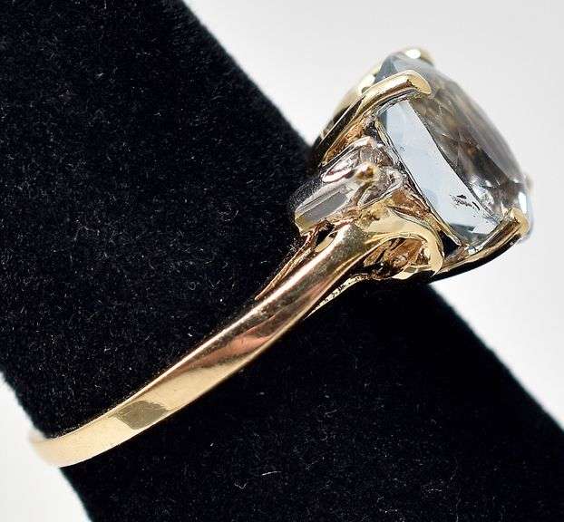 Beautiful 14K Yellow Gold Blue Topaz and Diamond Ring