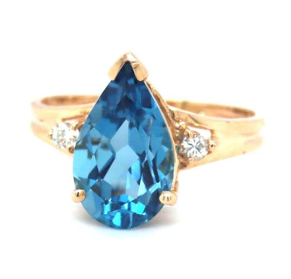 14kt Yellow gold 5.50ctw pear shaped blue topaz and diamond accent ring