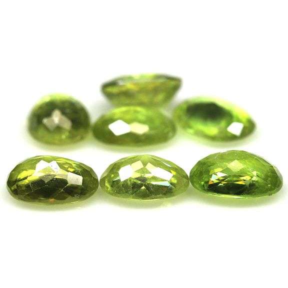 Collectors 8.74ct rich lime yellow Sphene set