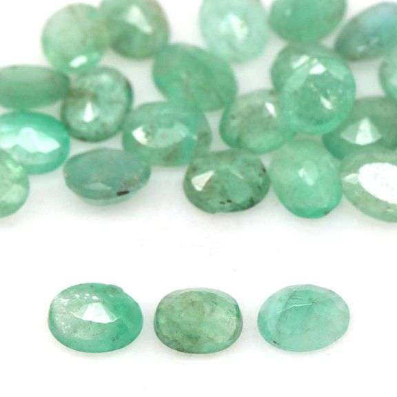 Bright emerald green 6.65ct 24pc Emerald set