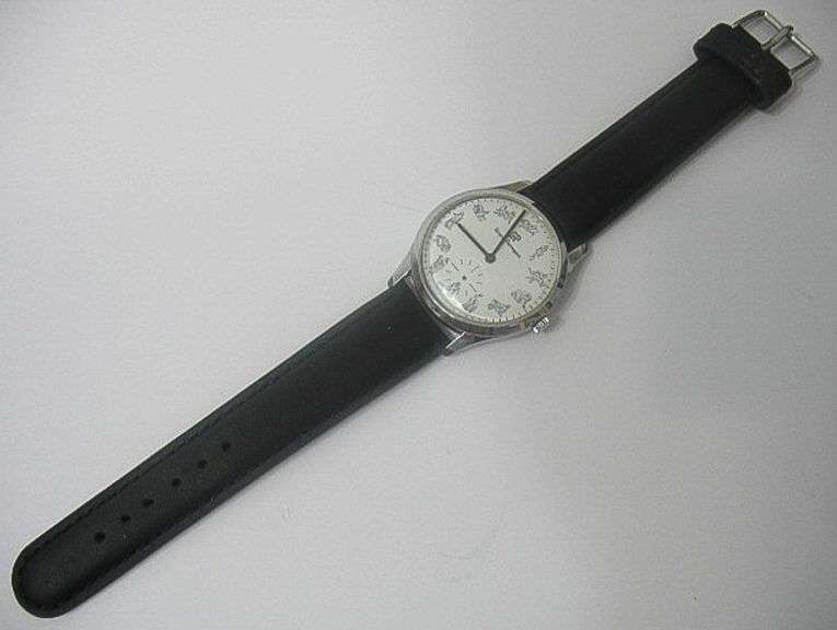 CONTENT OF SAFE DEPOSIT BOX: RARE GIRARD PERREAUX WITH KAMA SUTRA DIAL