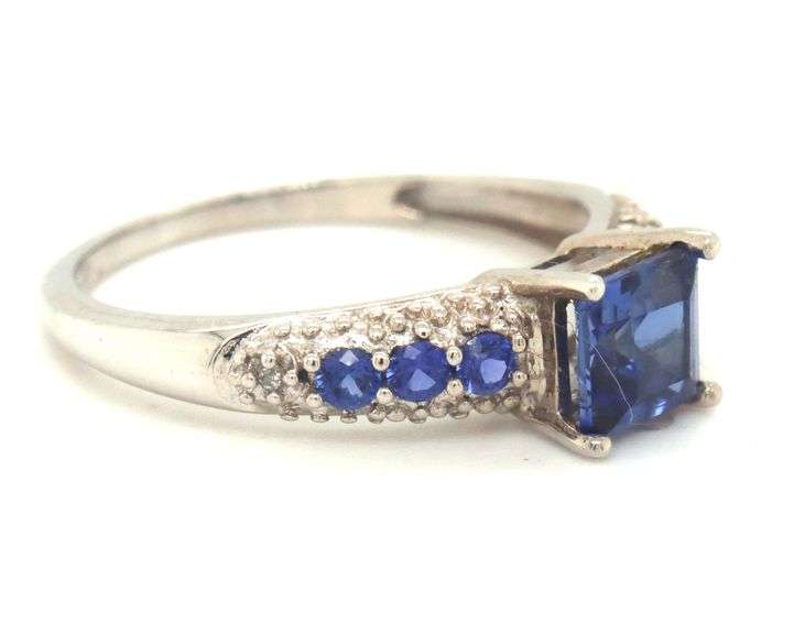 10kt White gold emerald cut blue sapphire cocktail ring