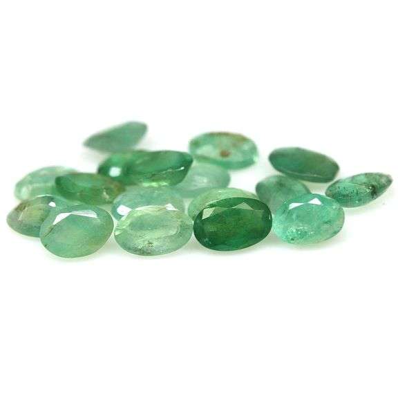 Oval cut 5.90ct 17pc Zambain Emerald set