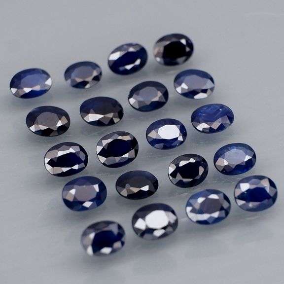 Beautifully colored 4.03ct ink blue Sapphire set