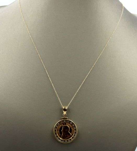 1/10oz Kruferrand coin pendant on 14kt yellow gold chain